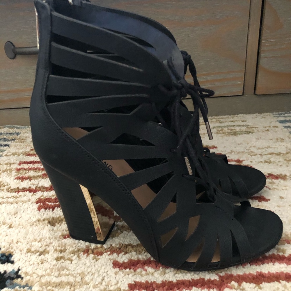Cute black lace up heels with zipper in the back